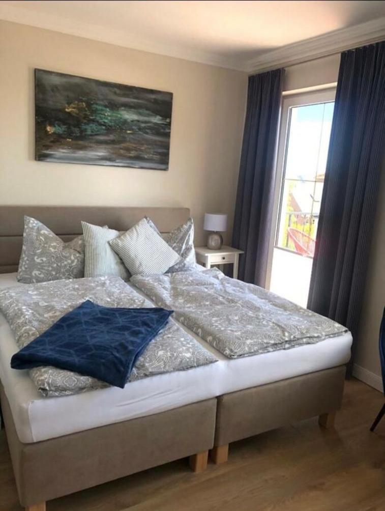 Апартаменты Ostseestrand-apartments Остзебад Нинхаген